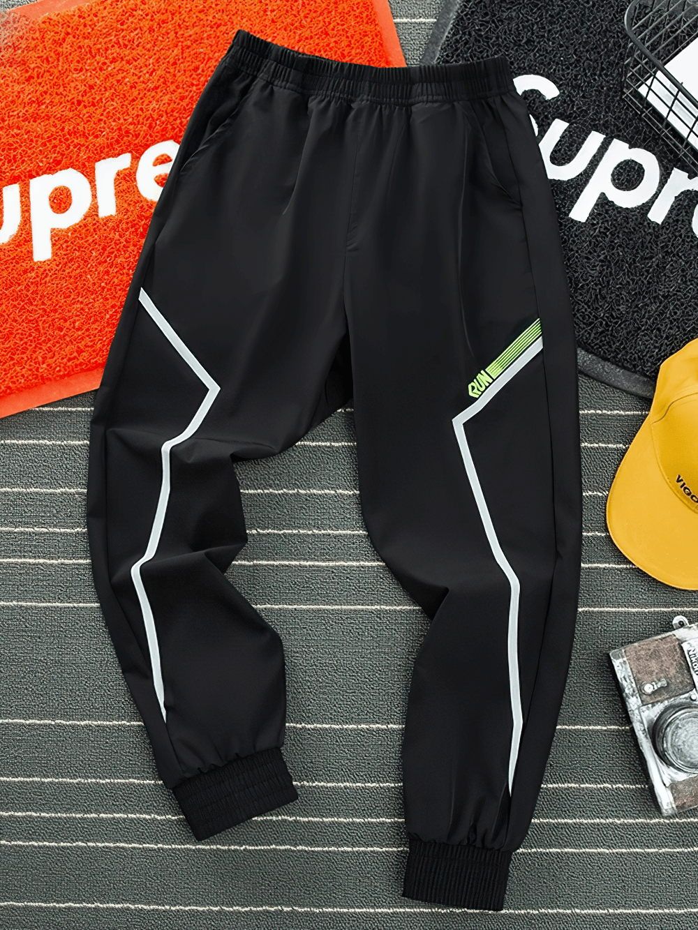 Quick-drying Sports Pants for Boys with Side Pockets - SF3619, black, elastic waist, side pockets, displayed on striped background